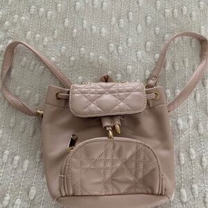 Claire's Quilted Drawstring Mini Backpack - Light Pink